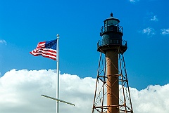 American Flag Waves By Marblehead Lighthouse